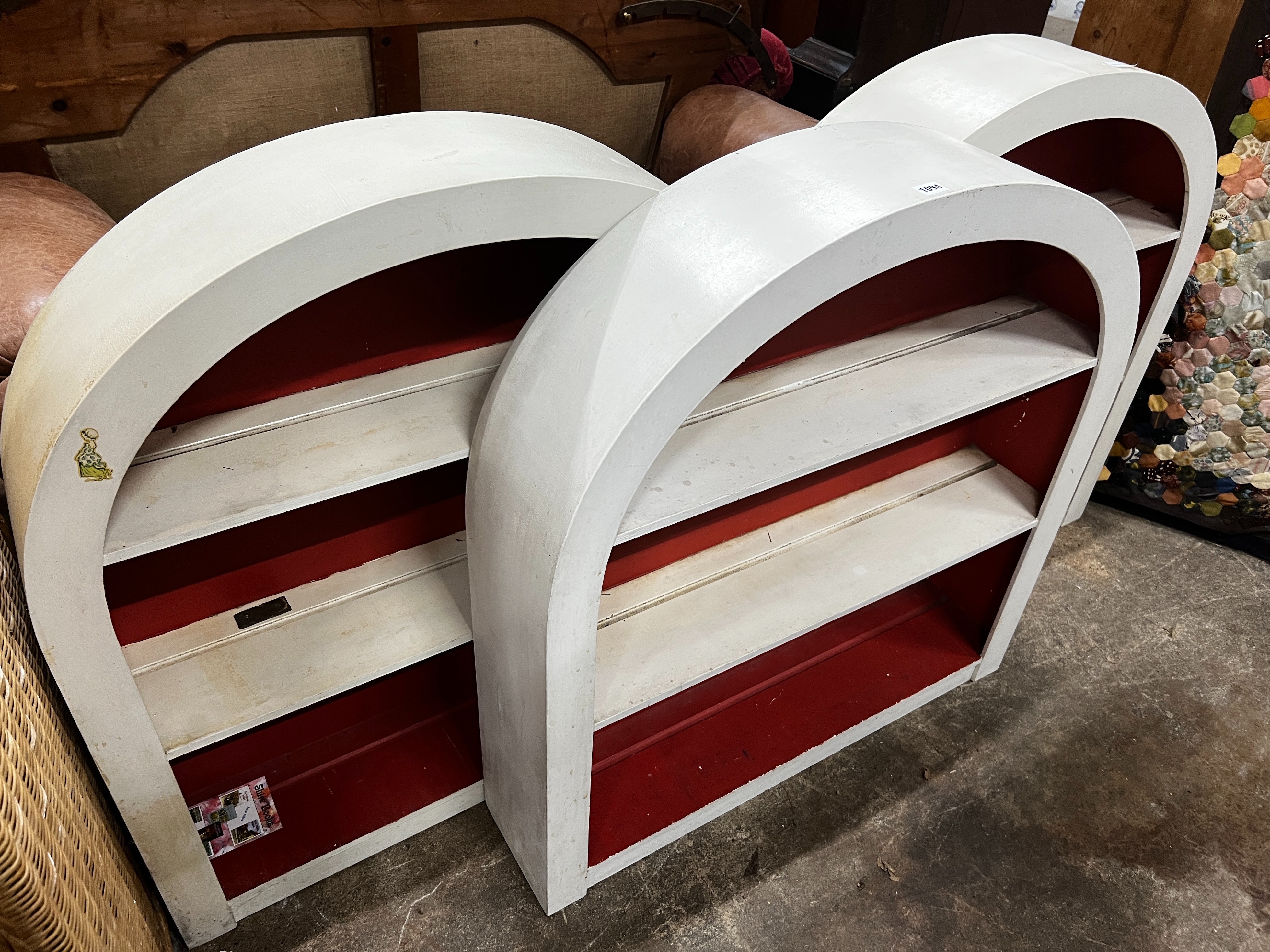 Three painted 20th century domed ex shop-display bookcases, length 91cm, height 97cm